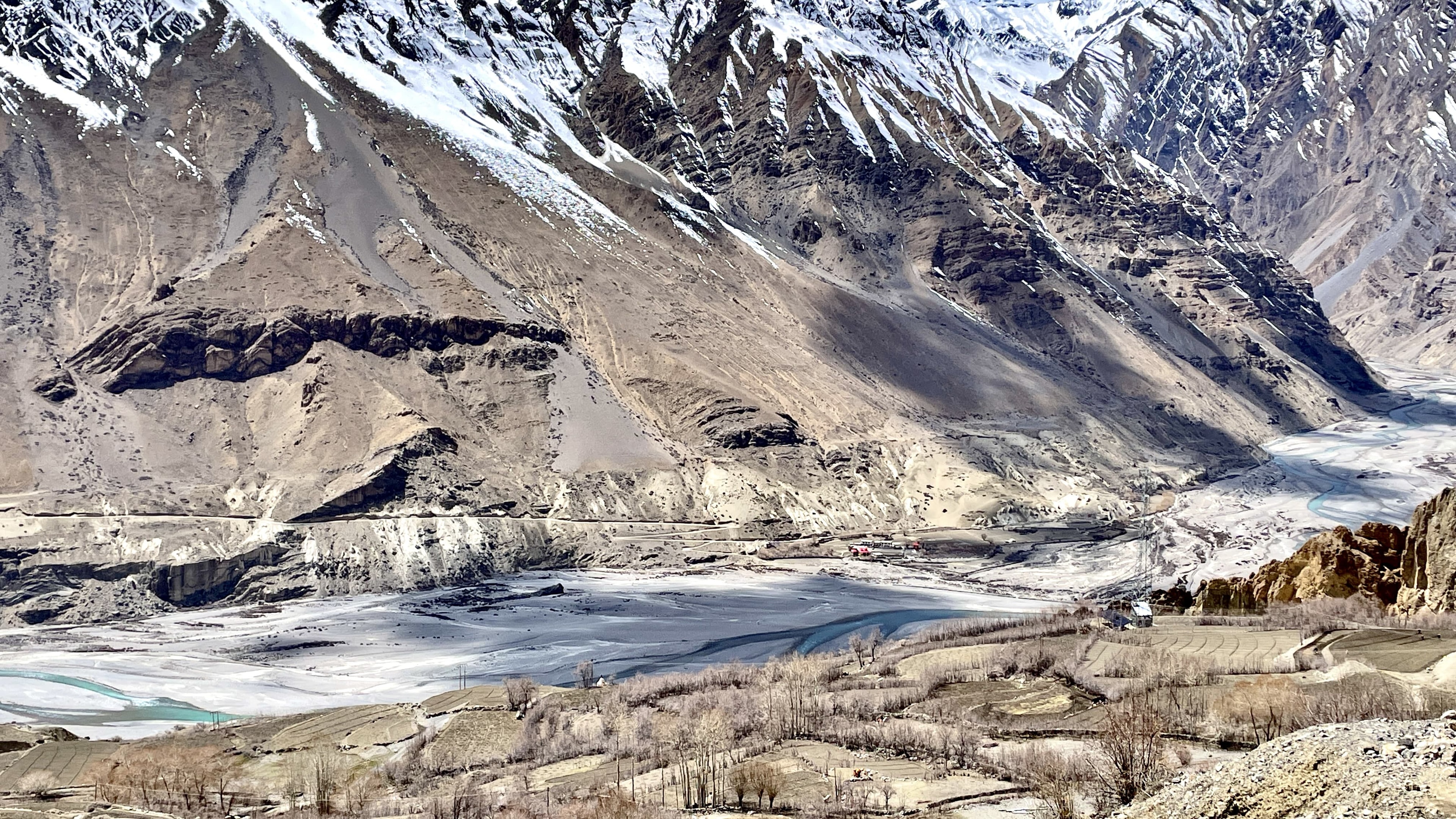 Frozen Spiti River winding through a barren winter valley